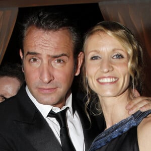 Alexandra Lamy et Jean Dujardin à la soirée au Fouquet's des César en 2012