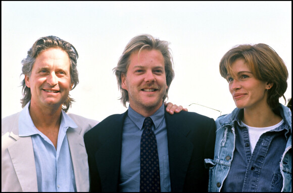 Michael Douglas, Kiefer Sutherland et Julia Roberts au Festival de Deauville 1990. 