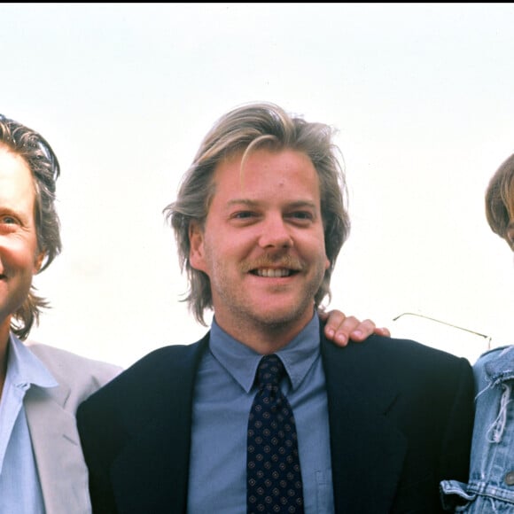 Michael Douglas, Kiefer Sutherland et Julia Roberts au Festival de Deauville 1990. 