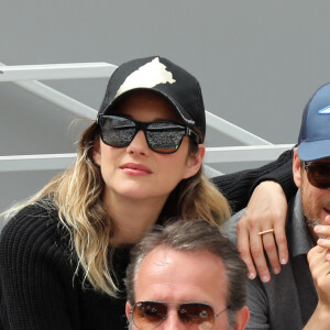 Marion Cotillard et son compagnon Guillaume Canet - People dans les tribunes lors de la finale messieurs des internationaux de France de tennis de Roland Garros 2019 à Paris le 9 juin 2019. © Jacovides-Moreau/Bestimage.