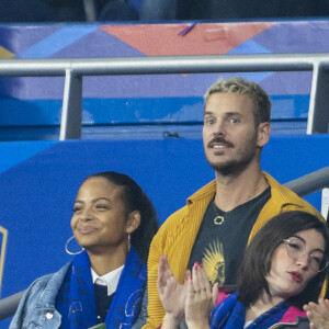 M. Pokora (Matt Pokora), sa femme Christina Milian assistent au match de la 5ème et avant-dernière journée de Ligue des nations entre la France et l'Autriche (2-0) au Stade de France à Saint-Denis le 22 septembre 2022.