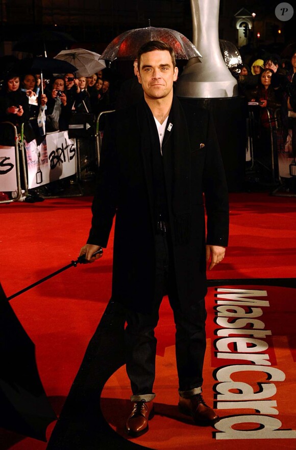 Robbie Williams sur le tapis rouge des Brit Awards, à Londres, le 16 février 2010 !