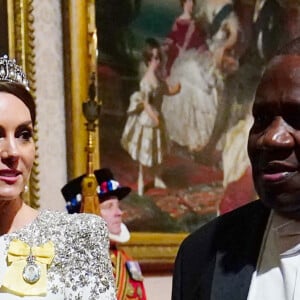 Catherine (Kate) Middleton, princesse de Galles (porte le diadème "Lover's Knot", le préféré de Diana), Cyril Ramaphosa, président de l'Afrique du Sud - Arrivées au Banquet d'Etat organisé au palais de Buckingham, à Londres, pendant la visite d'Etat du président sud-africain au Royaume-Uni le 22 novembre 2022. 