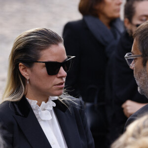 Sophie Tapie et Stéphane Tapie (Fille et fils du défunt) - Sorties de la messe funéraire en hommage à Bernard Tapie en l'église Saint-Germain-des-Prés à Paris. Le 6 octobre 2021 © Jacovides-Moreau / Bestimage