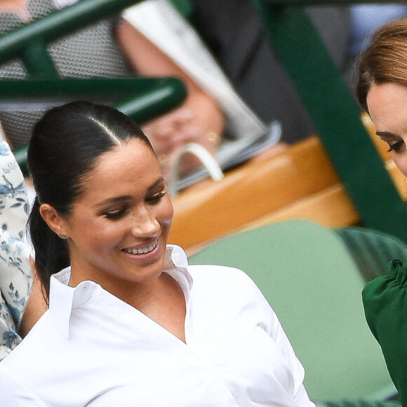 Archives - Catherine (Kate) Middleton, duchesse de Cambridge, Meghan Markle, duchesse de Sussex, sont dans les tribunes lors de la finale femme de Wimbledon "Serena Williams - Simona Halep (2/6 - 2/6) à Londres le 13 juillet 2019. © Chryslène Caillaud / Panoramic / Bestimage 