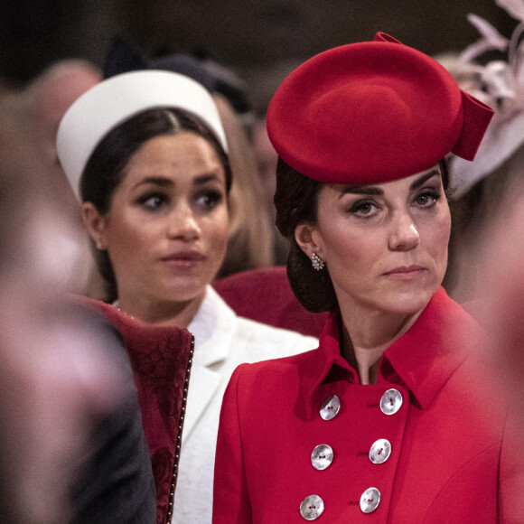 Catherine Kate Middleton, duchesse de Cambridge, Meghan Markle, enceinte, duchesse de Sussex lors de la messe en l'honneur de la journée du Commonwealth à l'abbaye de Westminster à Londres.