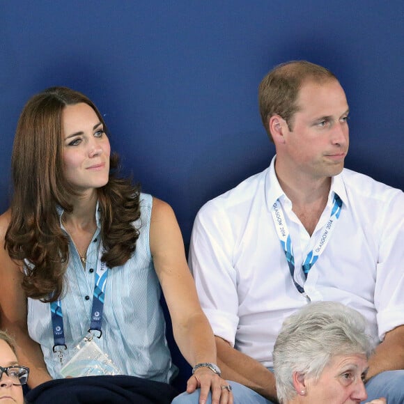 Le prince William, Catherine Kate Middleton, la duchesse de Cambridge et le prince Harry assistent à l'épreuve de natation aux XXèmes Jeux du Commonwealth à Glasgow, le 28 juillet 2014. 