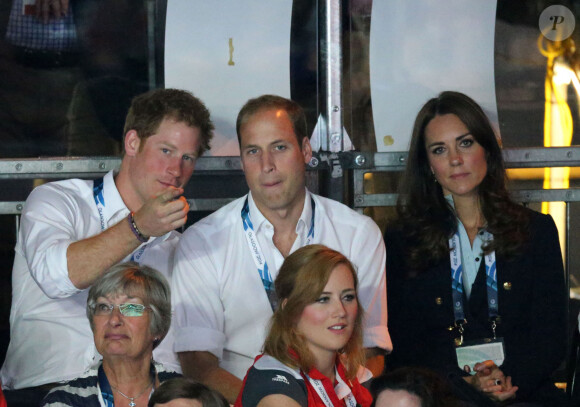 Le prince Harry, le prince William, duc de Cambridge et Catherine Kate Middleton, duchesse de Cambridge assistent aux XXèmes Jeux du Commonwealth à Glasgow, le 28 juillet 2014. 