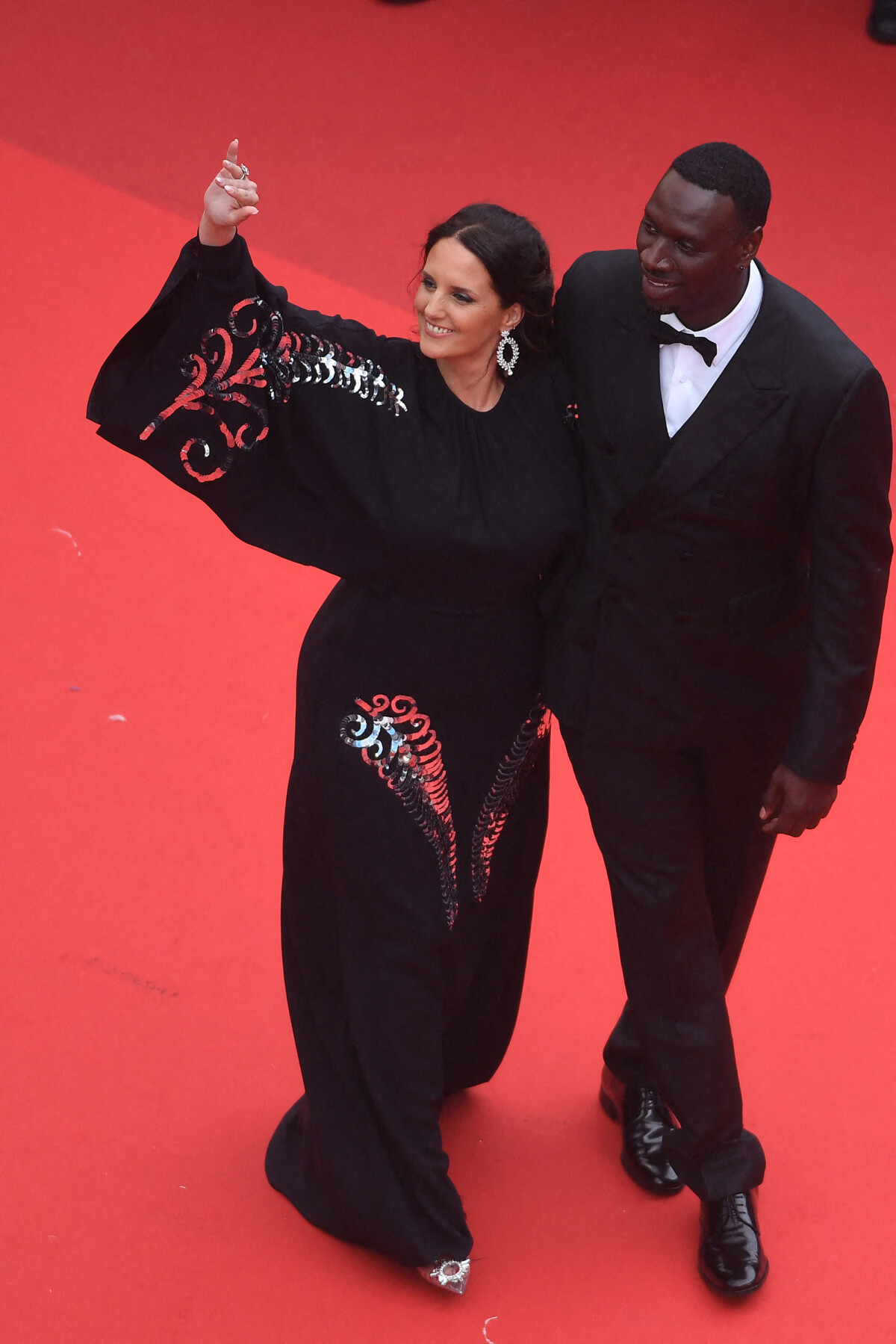 Photo Omar Sy et sa femme Hélène Montée des marches du film " Top