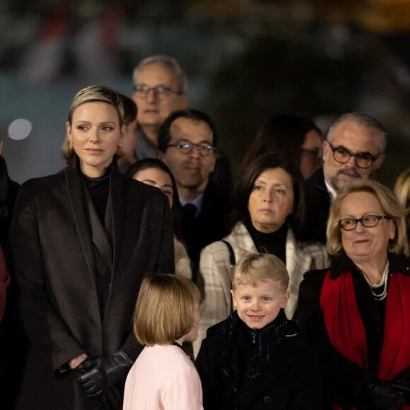 La princesse Charlène de Monaco avec ses enfants la princesse Gabriella de Monaco, comtesse de Carladès, et le prince Jacques de Monaco, marquis des Baux, Mélanie-Antoinette de Massy - La famille princière de Monaco participe à l'embrasement de la barque lors des célébrations de la Sainte-Dévote sur le quai Albert 1er à Monaco le 26 janvier 2023. © Claudia Albuquerque / Bestimage