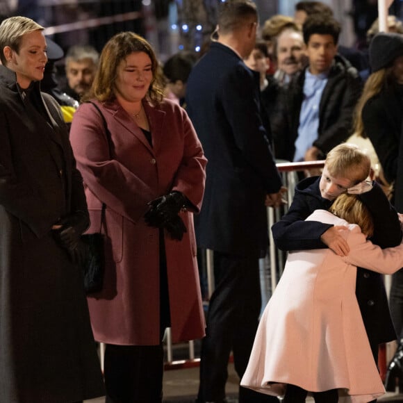 La princesse Charlène de Monaco avec ses enfants la princesse Gabriella de Monaco, comtesse de Carladès, et le prince Jacques de Monaco, marquis des Baux, Mélanie-Antoinette de Massy - La famille princière de Monaco participe à l'embrasement de la barque lors des célébrations de la Sainte-Dévote sur le quai Albert 1er à Monaco le 26 janvier 2023. © Claudia Albuquerque / Bestimage