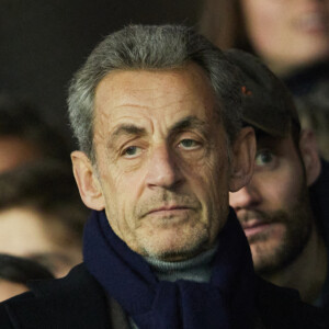 Nicolas Sarkozy et son fils Louis - People en tribunes du match de Ligue 1 Uber Eats "PSG contre Reims" (1-1) au Parc des Princes à Paris le 29 janvier 2023.