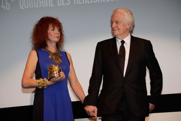 Sabine Azéma et André Dussollier lors de l'hommage à feu Alain Resnais - qui a reçu le Carrosse d'or, durant la Quinzaine des réalisateurs, dans le cadre du Festival de Cannes le 15 mai 2014