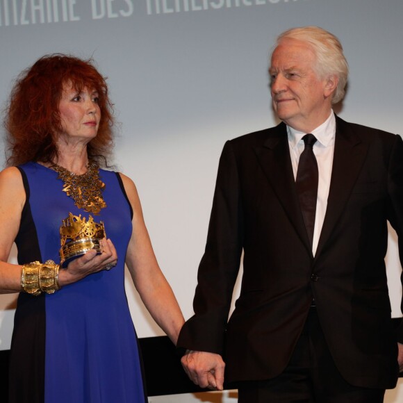 Sabine Azéma et André Dussollier lors de l'hommage à feu Alain Resnais - qui a reçu le Carrosse d'or, durant la Quinzaine des réalisateurs, dans le cadre du Festival de Cannes le 15 mai 2014