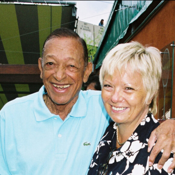 Henri Salvador et sa femme Catherine - Demi-finales du tournoi de tennis de Roland-Garros 2004