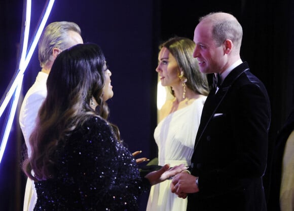 Sentant qu'il la taquinait, la future reine d'Angleterre se serait donc permis de lui taper les fesses en guise de "réprimande sexy." 
Le prince William, prince de Galles, et Catherine (Kate) Middleton, princesse de Galles, arrivent à la 76ème cérémonie des British Academy Film Awards (BAFTA) au Royal Albert Hall à Londres, le 19 février 2023. 