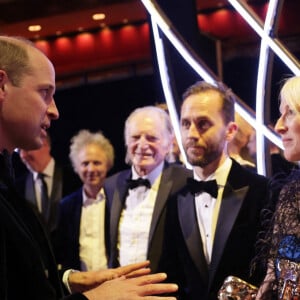 Le prince William, prince de Galles, et Catherine (Kate) Middleton, princesse de Galles, arrivent à la 76ème cérémonie des British Academy Film Awards (BAFTA) au Royal Albert Hall à Londres, le 19 février 2023. 