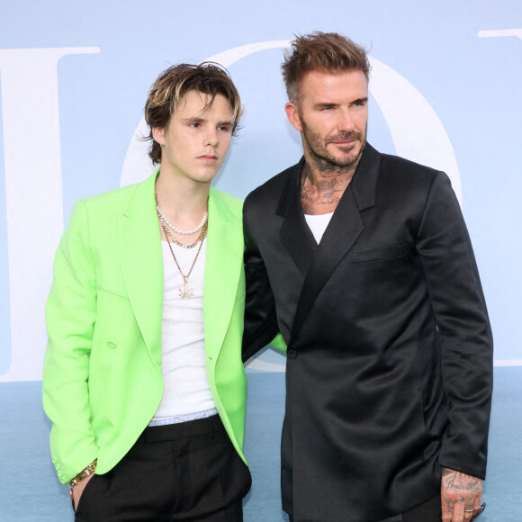 David Beckham et son fils Cruz au photocall du défilé de mode Homme printemps-été 2023 Dior à l'école du Val de Grâce à Paris, France, le 24 juin 2022. © Bertrand Rindoff/Bestimage 