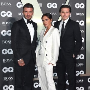 David Beckham, Victoria Beckham, Brooklyn Beckham lors de la soirée "GQ Men of the Year" Awards à Londres le 3 septembre 2019. 