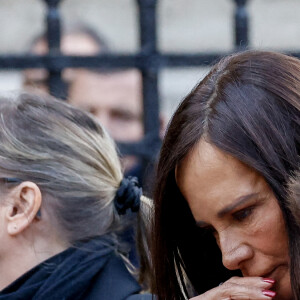 "Disons que je ne suis pas prête à le remplacer", a-t-elle estimé.
Nathalie Marquay et son fils Tom - La famille de Jean-Pierre Pernaut à la sortie des obsèques en la Basilique Sainte-Clotilde à Paris le 9 mars 2022. © Cyril Moreau/Bestimage