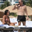 David Guetta super musclé à 55 ans : virée à la plage avec sa jeune compagne, divine en bikini string