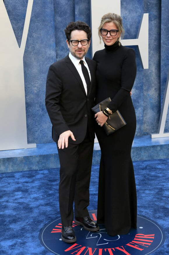 J.J. Abrams et sa femme Katie McGrath au photocall de la soirée "Vanity Fair" lors de la 95ème édition de la cérémonie des Oscars à Los Angeles, le 12 mars 2023. 