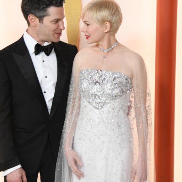 Michelle Williams, comme Austin Butler, s'est également consolée avec son mari.
THOMAS KAIL ET MICHELLE WILLIAMS au photocall de la 95ème édition de la cérémonie des Oscars à Los Angeles, le 12 mars 2023. © Kevin Sullivan via Zuma Press/Bestimage 