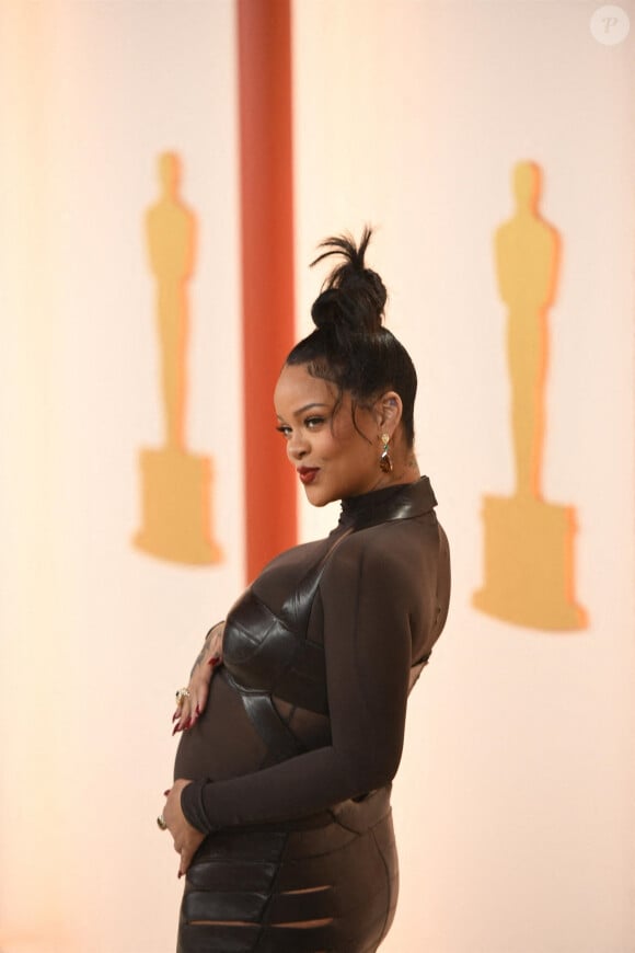 Rihanna (enceinte) au photocall de la 95ème édition de la cérémonie des Oscars à Los Angeles, le 12 mars 2023. 