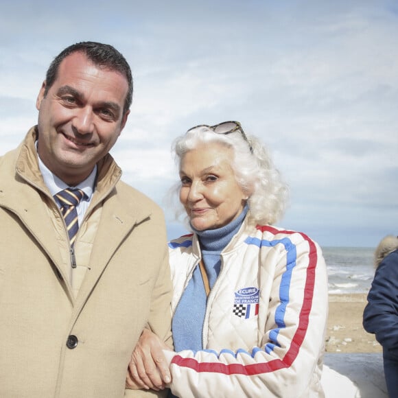 Exclusif - Christophe Blanchet (Député du Calvados), Martine Lelouch - Inauguration de la "Promenade Claude Lelouch" qui porte désormais son nom en présence d'un public nombreux et de la famille du réalisateur à Villers-sur-Mer le 26 mars 2023. © Jack Tribeca / Bestimage