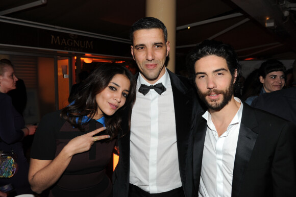 Exclusif - Leila Bekhti pose avec son mari Tahar Rahim accompagne de son frere Ahmed - Soiree Magnum pour le film "Le passe" lors du 66eme festival de Cannes le 17 mai 2013. 