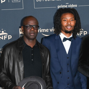 Lilian Thuram et son fils Khephren Thuram - Photocall de la cérémonie des Trophées UNFP 2022 au Pavillon Gabriel à Paris le 15 mai 2022. © Coadic Guirec/Bestimage