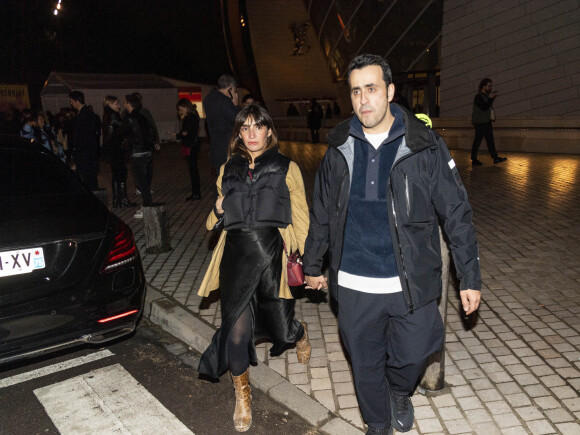 Exclusif - Jonathan Cohen et sa compagne Giulietta Canzani Mora Dj Piu Piu (enceinte) - Les célébrités au concert de Jay Z à la fondation Louis Vuitton à Paris, France, le 14 avril 2023. © Da Silva-Perusseau/Bestimage 