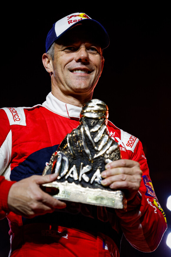 Le pilote français est une légende des sports automobiles avec notamment 9 titres de champion du monde des rallyes

Sébastien Loeb - Podium du "Dakar 2023" à Amman en Arabie Saoudite, le 15 janvier 2023.