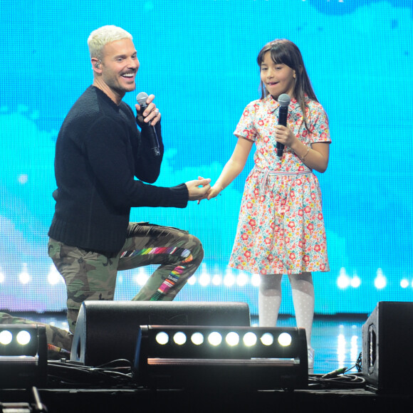 Exclusif - M.Pokora (Matt Pokora) et Elyne - Enregistrement de l'émission "Ce soir on chante pour l'Unicef, pour chaque enfant" à La Seine Musicale, diffusée le 25 avril sur W9. Le 13 mars 2023. W9 vous propose une soirée musicale exceptionnelle, "Ce soir on chante pour l'UNICEF, pour chaque enfant",au profit du fond d'urgence de l'UNICEF. Depuis plus de 75 ans, l'UNICEF se bat pour les enfants et leurs familles au coeur des crises humanitaires, que ce soit actuellement sur le front de la guerre en Ukraine, dans les ruines du séisme en Turquie et en Syrie ou au coeur d'une sècheresse dévastatrice dans la corne de l'Afrique,les enfants sont toujours les premières victimes.Aux côtés de nombreux artistes, E.Gossuin et J.Anthony vous donnent rendez-vous pour se mobiliser, pour chaque enfant. Chacun des artistes partagera un duo unique avec un enfant, des moments de partages émouvants et inédits. Symbole de notre solidarité avec les enfants du monde, ces jeunes chanteurs feront leurs premiers pas sur scène. S'ils ont un peu le trac, ils sont surtout bourrés de talents et très fiers de s'impliquer pour l'UNICEF. À leurs côtés, des artistes que vous adorez : M.Pokora, K.Girac, A.Bent, Yanns, Anisha Louis et Enola, Nej, mais aussi P.Bruel, C.Badi, T.Arena, C.Capéo, et bien d'autres. C'est une soirée musicale exceptionnelle qui vous attend ! © G.Gaffiot-J.Tribeca / Bestimage 