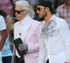 Le couturier si célèbre devait en effet un grand nombre d'impayés au fisc.
Karl Lagerfeld se promene avec Sebastien Jondeau, son assistant et maintenant sa nouvelle muse, dans les rues de Saint-Tropez, le 13 juillet 2013.