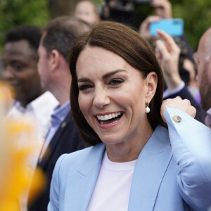 Andrew Matthews_72064498 - Le prince William, prince de Galles, et Catherine (Kate) Middleton, princesse de Galles, à la rencontre du public du concert du couronnement près du château de Windsor Catherine (Kate) Middleton, princesse de Galles - Le prince de Galles, et la princesse de Galles, à la rencontre du public du concert du couronnement près du château de Windsor, le 7 mai 2023. Au lendemain du sacre du roi d'Angleterre et de la reine consort, L.Richie, K.Perry et le groupe Take That, sans R.Williams, Andrea Bocelli seront quelques un des artistes à se produire sur scène pour fêter l'événement.