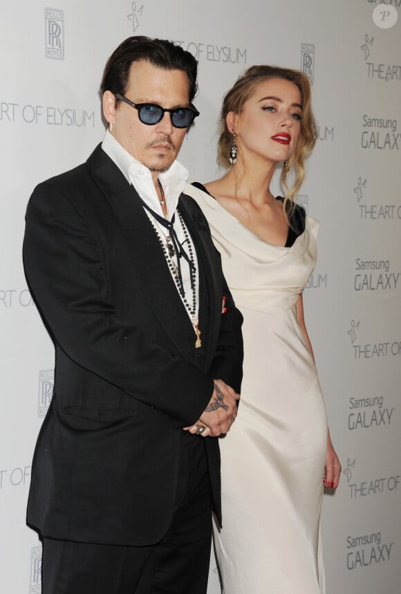 Johnny Depp et Amber Heard à la soirée "8th Annual Heaven Gala Art of Elysium and Samsung Galaxy" à Los Angeles. le 10 janvier 2015
