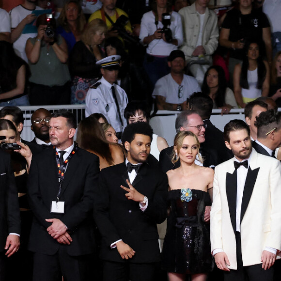 A ses côtés, l'autre star, The Weeknd, désormais appelé par son vrai nom Abel Tesfaye
Abel "The Weeknd" Tesfaye, Lily-Rose Depp, Sam Levinson - Montée des marches du film " The Idol " lors du 76ème Festival International du Film de Cannes, au Palais des Festivals à Cannes. Le 22 mai 2023 © Jacovides-Moreau / Bestimage