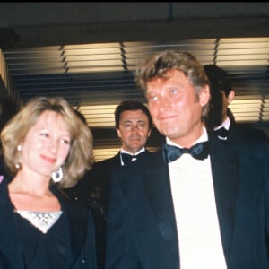 Johnny Hallyday et Nathalie Baye en soirée à Cannes en 1984