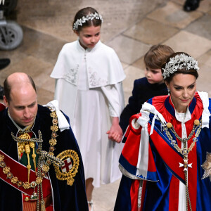 Le prince William, prince de Galles, et Catherine (Kate) Middleton, princesse de Galles, la princesse Charlotte de Galles, et le prince Louis de Galles, lors de la cérémonie de couronnement du roi d'Angleterre à Londres, Royaume Uni, le 6 mai 2023.
