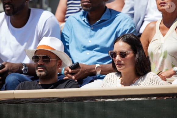 Tony Parker et sa compagne Alizé Lim en tribunes lors des Internationaux de France de tennis de Roland Garros 2023 à Paris, France, le 4 juin 2023. © Cyril Moreau/Bestimage