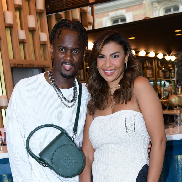 L'occasion pour le couple de s'afficher main dans la main. 
Exclusif - Black M et sa femme Léa Djadja - Inauguration du restaurant du rappeur Black M, le "Merci Charles !" au 35 Bd Berthier 750017 à Paris le 8 juin 2023. © Rachid Bellak/Bestimage 