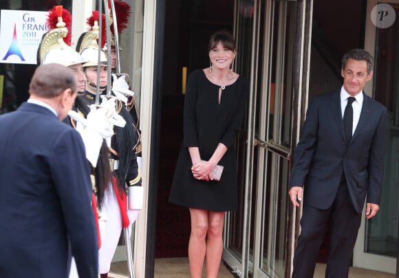 Nicolas Sarkozy et Carla Bruni (enceinte) - Dîner lors du sommet du G8 à Deauville au restaurant avec Silvio Berlusconi