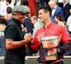"C'est marrant, j'ai l'impression d'assister à mon enterrement, mais plutôt de manière positive", explique-t-il au micro d'Europe 1
 
Yannick Noah, Novak Djokovic - Novak Djokovic remporte les Internationaux de France de tennis de Roland Garros 2023 face à Casper Ruud (7-6 [7-1], 6-3, 7-5) à Paris le 11 juin 2023. Novak Djokovic s'adjuge un 23ème titre record en Grand Chelem et dépasse Rafael Nadal, bloqué à 22 titres et forfait cette année. © Jacovides-Moeau/Bestimage