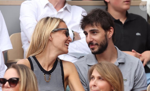 Ben Attal et sa compagne Jordane Crantelle dans les tribunes lors des Internationaux de France de Tennis de Roland Garros 2023. Paris, le 7 juin 2023. © Jacovides-Moreau / Bestimage 