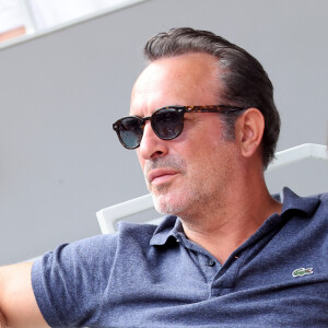 Jean Dujardin et sa femme Nathalie Péchalat - Célébrités en tribunes des Internationaux de France de tennis de Roland Garros 2023 à Paris le 11 juin 2023. © Jacovides-Moreau/Bestimage