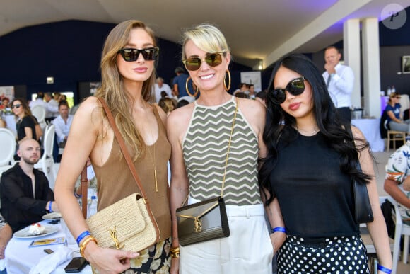 Exclusif - Mathilde Pinault, Laeticia Hallyday et sa fille Joy dans l'Espace VIP lors de la 9ème édition du "Longines Paris Eiffel Jumping" au Champ de Mars à Paris, France, le 25 juin 2023. © Perusseau-Veeren/Bestimage 