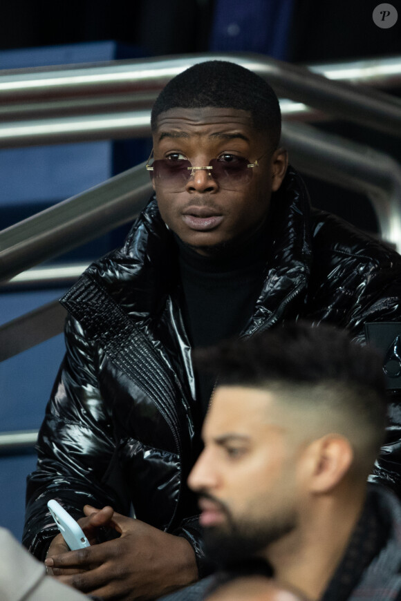 Le rappeur Ninho dans les tribunes lors du match de Ligue 1 opposant le Paris Saint-Germain à l'AS Monaco au Parc des Princes à Paris, France, le 12 janvier 2020. Le PSG fait match nul face à l'AS Monaco (3-3). 