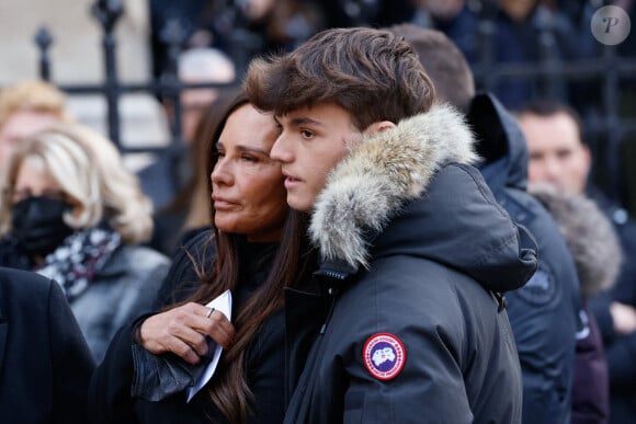 Nathalie Marquay et son fils Tom - La famille de Jean-Pierre Pernaut à la sortie des obsèques en la Basilique Sainte-Clotilde à Paris le 9 mars 2022. © Cyril Moreau/Bestimage