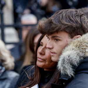 Nathalie Marquay et son fils Tom - La famille de Jean-Pierre Pernaut à la sortie des obsèques en la Basilique Sainte-Clotilde à Paris le 9 mars 2022. © Cyril Moreau/Bestimage